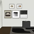 Modern Interior With Framed Wall Artworks On White Wall And Black Cabinet