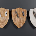 Medieval Wooden Shields With Metal Accents And Ornate Designs On