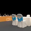 Elegant Event Table And Chairs Setup With White Seats Blue Bows And Orange Backdrop