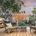 Waterside Landscape With Wooden Deck Rocking Chairs Coffee Table Green Plants And Sunset Sky