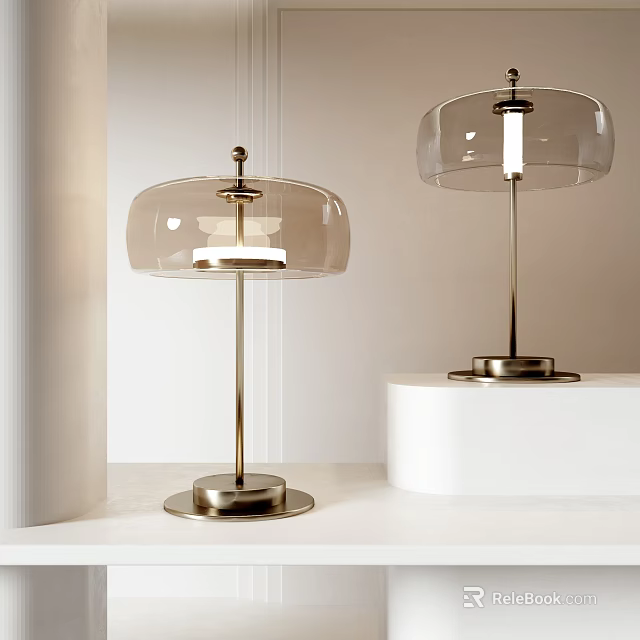 Modern Table Lamps with Clear Glass Shades and Brass Metal Base on White Pedestals 3d model 