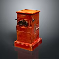Vintage Red Phonograph Like Device With Two Circular Components And Shiny Surface