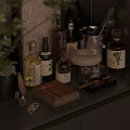 Elegant Home Bar Setup with Liquor Bottles Cigar Case Ice Bucket and Green Plant