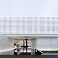 Modern Minimalist Sales Office Building With Glass Façade Waterfront And Greenery