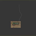 Mechanical Model of Spacecraft Propulsion Mechanism With Green Body Red Wheel and Wooden Base