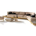 Modern L Shaped Sofa With Beige Upholstery Black Cushions And Round Wooden Coffee Table