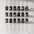 Light Gray Background Wall With Neatly Arranged Black Shelves And Gold White Decorations