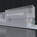 Modern Exhibition Booth Featuring White Hanging Design Circular Allo Baby Logo And Display Tables