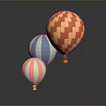 Three Colorful Hot Air Balloons With Patterned Designs On Gray Background