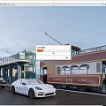 White Sports Car And Black Vehicle Parked Near Vintage Tram At Station