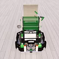 Green Black Mechanical Device with Reels Wheels And Metal Frame on Wooden Floor Surface