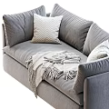 Two Seater Gray Fabric Sofa With Decorative Pillows And Fringed Blanket