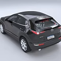 Black Mazda SUV With Modern Sleek Body And Silver Alloy Wheels