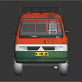 Orange and Green Car With Caribbean Dago Love Bye Sticker Black Roof Rack Open Door And Silver Wheels