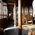 Chinese Style Reception Room With Wooden Furniture Carved Doors And Windows Lanterns Columns And Sunlight