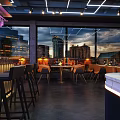 Modern Restaurant Interior With Neon Lights Bar Counter Wine Display And City View Windows