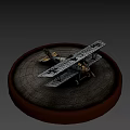 White And Yellow Model Airplane With Black Crosses On Round Gray Base