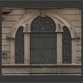 Classic Stone Entrance Gate With Arched Top Iron Grille And Decorative Carvings