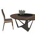 Round Wooden Dining Table Set With Beige Chair Black Tray And Sculpture Decor