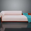 Modern Pink Sofa With Wooden Frame Rolled Cushion And Blue Throw Blanket