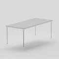 Modern rectangular dining table with sleek metal legs and smooth gray tabletop