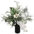 Black Vase Floral Arrangement with White Calla Lilies Orchids Tulips and Monstera Leaves