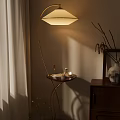 Elegant Floor Lamp With Small Table And Warm Light In Cozy Living Room