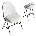 Light Colored Fabric Dining Chairs With Modern Sleek Metal Legs And Comfortable Design