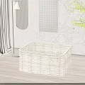 Woven Storage Basket in Modern Home with Wooden Floor Potted Plant and Decorative Panel