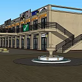 Modern Commercial Street Building With Multi Level Structure Staircase Storefronts And Central Fountain
