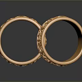 Ornate Gold Rings With Intricate Engraved Patterns And Shiny Finish