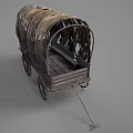 Vintage Covered Wagon With Tattered Canvas Top And Wooden Wheels
