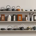 Minimalist Tea Sets Display With Various Teapots Teacups And Tea Canisters On Shelves