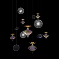 Intricate Hanging Decorative Orbs With Colorful Patterns Suspended Against Black Background