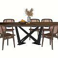 Wooden Dining Table Set with Rattan Back Chairs Black Cross Legs and Fruit Bowl