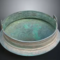 Ancient Bronze Sculpture Carving With Circular Shape Two Handles Greenish Patina And Decorative Engravings
