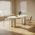 Oval White Modern Dining Table Set With Silver Legs Four Chairs And Green Plant Vase