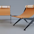 Modern Orange Lounge Chairs With Black Metal Frames And White Rolled Backrests