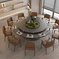 Elegant Modern Round Dining Table Set with Brown Chairs Green Centerpiece Natural Light through Window