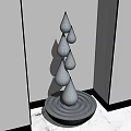 Silver Water Drop Sculpture With Stacked Teardrop Design And Circular Base