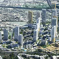 Aerial Planning of Urban Cityscape with High Rise Buildings and Coastal Iconic Structure
