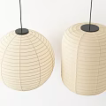 Beige Paper Lantern Style Pendant Lights With Round And Cylindrical Shapes And Black Bases