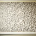 White Rough Textured Wall With Gold Frame In Interior Design