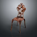 Ornate Metal Chair With Floral Leaf Patterns Intricate Back And Patterned Seat