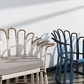 Modern Leisure Chairs With Wicker Backrest Beige And Blue Cushions And Sunlight Shadows