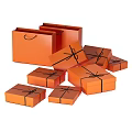 Decorative Orange Gift Boxes and Shopping Bags with Black Ribbons for Everyday Use