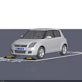 White Suzuki Hatchback Car Parked in Marked Parking Space With Yellow Parking Sensors
