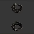 Pair of Medieval Black Leg Armor With Wavy Textured Patterns And Metallic Finish