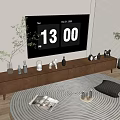 Modern TV Stand with Flat Screen TV Decorative Items Green Plants and Circular Patterned Rug