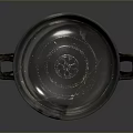 Metal Dish With Two Handles And Central Carved Sculpture Design